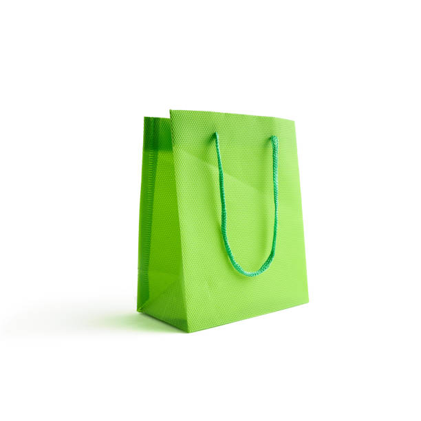 istock light green bag mockup for design isolated on a white background. space for text. sale concept. 1212819603