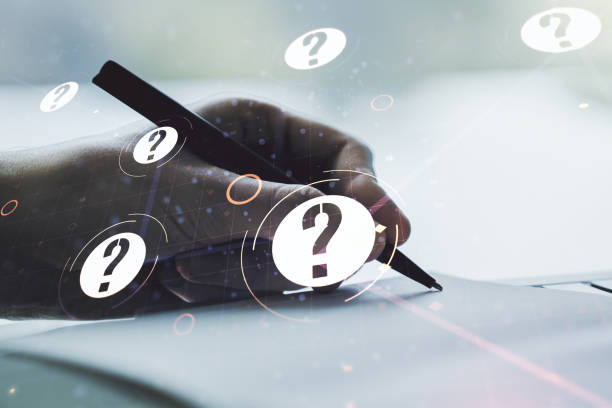 istock Creative concept of question mark illustration and man hand writing in notebook on background. FAQ and search concept. Multiexposure 1212820857