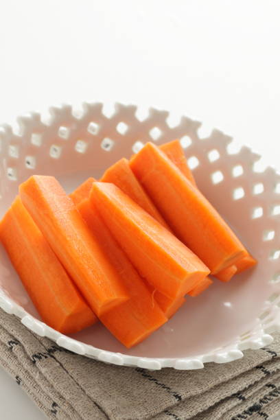 istock Chopped carrot in bowl 1212825512