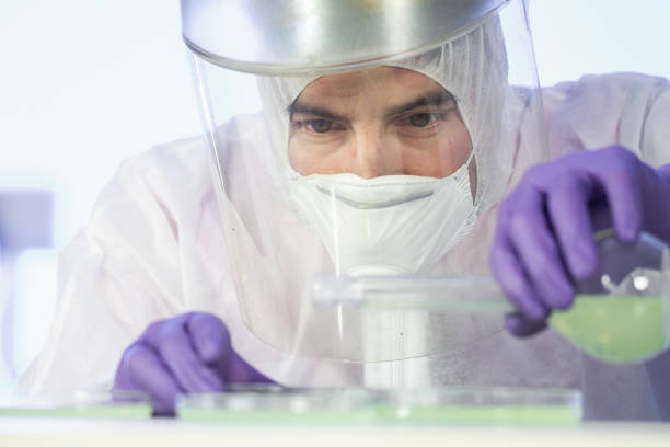 istock Scientist working in corona virus vaccine development laboratory research facility. 1212825531