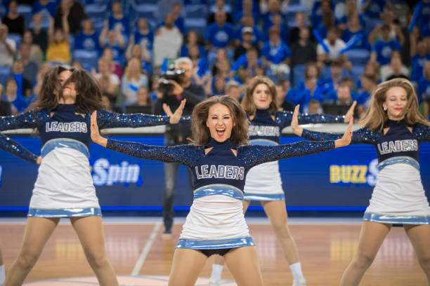 istock Cheerleaders performing in basketball court 1212828005