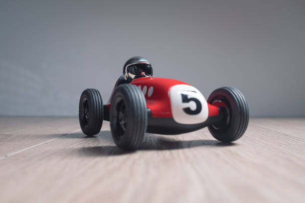 istock Red racing toy car with number five painted on it 1212828123
