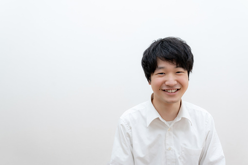 Portrait of Japanese businessman, smiling