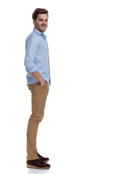 istock Side view of happy casual man smiling 1212831441