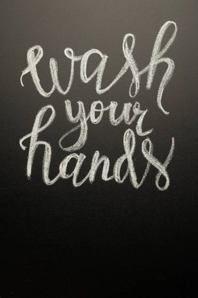 istock Coronavirus. Danger. Caring for cleanliness. Writing on the board - wash your hands 1212833628