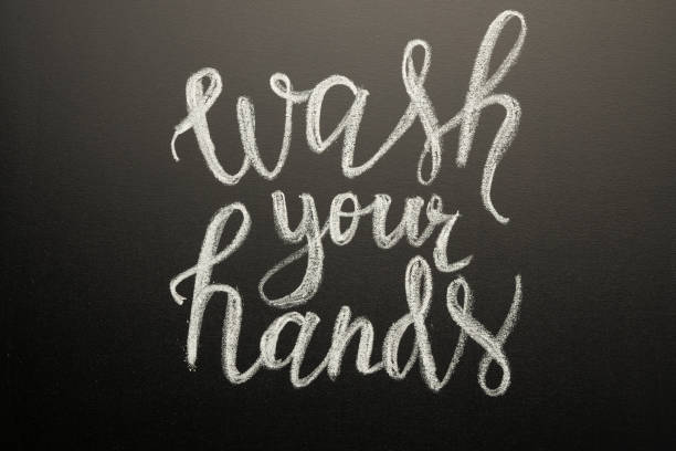istock Coronavirus. Danger. Caring for cleanliness. Writing on the board - wash your hands 1212834466
