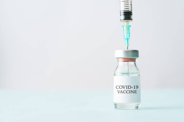 istock Medical Vials and Syringe 1212839522