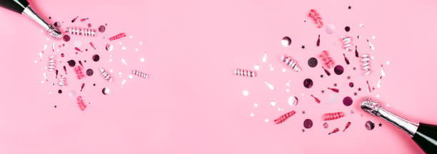 istock Bottle of champagne with confetti 1212840713