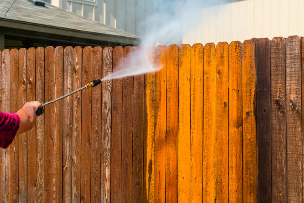 Pressure Washing Wooden Fence Pressure Washing Wooden Fence manual worker house work tool equipment stock pictures, royalty-free photos & images