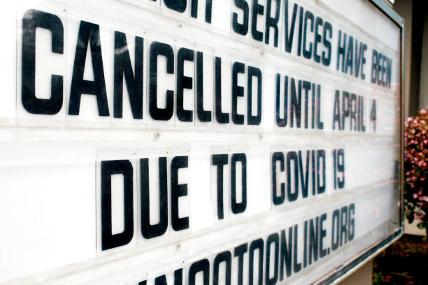 Sign that reads: Event is cancelled until April due to Coronavirus COVID-19