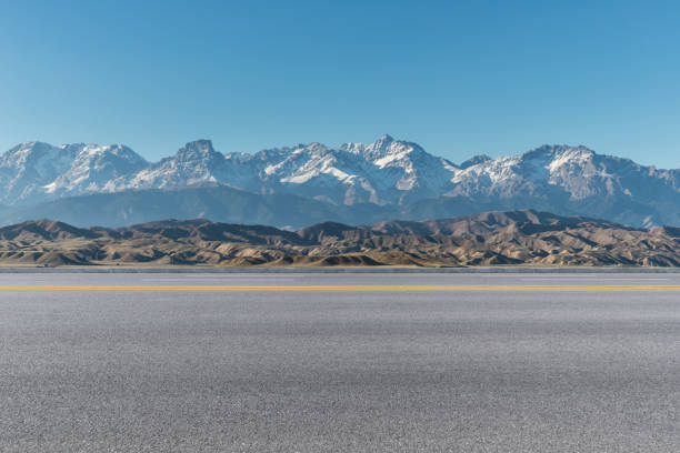 istock empty asphalt road with beautiful natural landscape in xinjiang 1212853078