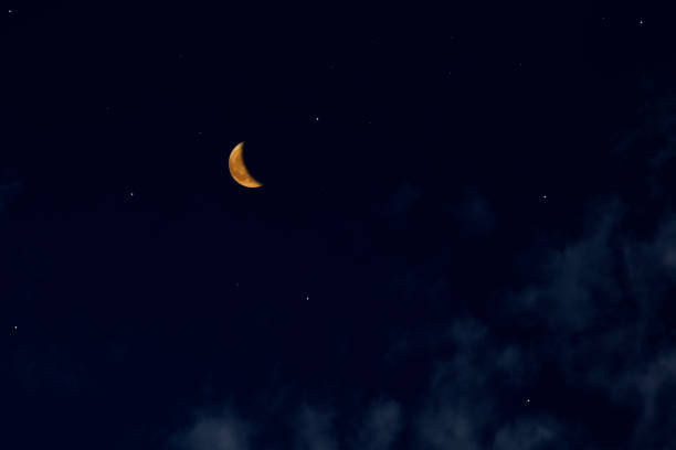 istock Crescent moon and lots of stars 1212854671