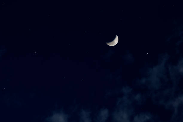 istock Crescent moon and lots of stars 1212854677