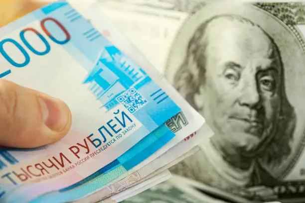 dollars and rubles. The concept of currency exchange. Economic crisis, decline of the world economy. Ruble devaluation. The fall of the Russian currency. Currency exchange at the Bank.