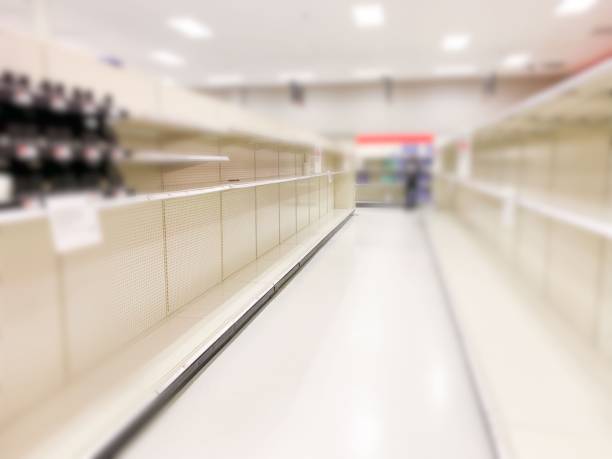 istock Empty Shelves in Food Store Due To Coronavirus 1212857344
