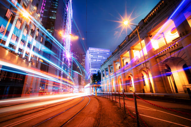 istock City Traffic Light Trail in Hong Kong 1212869427