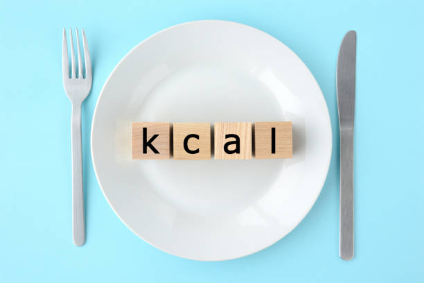 istock Wooden blocks with kcal words on plate 1212874722
