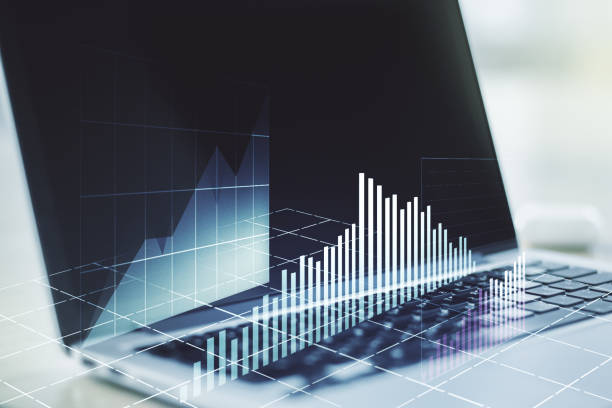 istock Abstract creative financial graph on modern laptop background, forex and investment concept. Multiexposure 1212874862