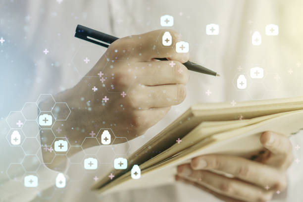 istock Creative abstract medical sketch and man hand writing in notepad on background, Medicine and healthcare concept. Multiexposure 1212875700