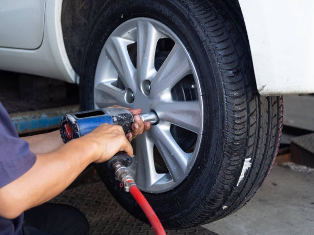 istock Close up mechanic man hand use tire changing tools 1212875769