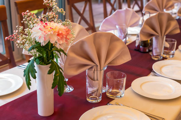 table set for wedding or another catered event dinner - table wedding flower bow imagens e fotografias de stock