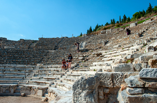 Selcuk-Izmir, Turkey - June 22, 2019: People are visiting ODEON is the parliamentary building structure of the ancient period, Ephesus Ancient City in Izmir, Turkey