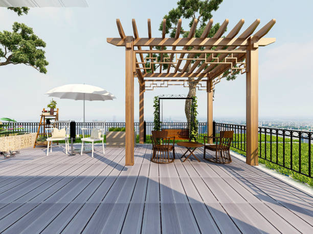 istock 3D rendering, sunlit terrace with green plants, lounge chairs, pool, etc. 1212882721