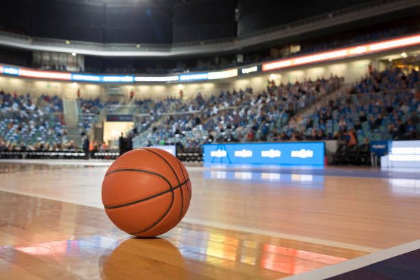 istock Basketball ball on court 1212887439