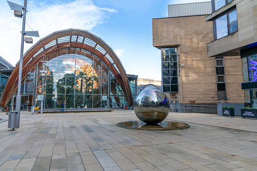 Sheffield, England, UK - November 10, 2019:  The Millennium Gallery, Gardens and some unusual modern water features in Sheffield.