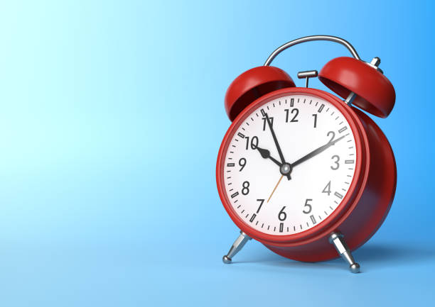 istock Red vintage alarm clock on bright blue background in pastel colors 1212889936