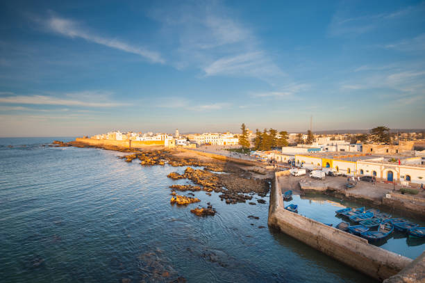 The massive city walls of Essaouira, Morocco in wonderful evening sun The massive city walls of Essaouira, Morocco in wonderful evening sun essaouira stock pictures, royalty-free photos & images