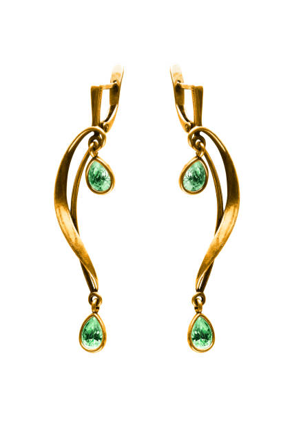istock Gold earrings isolated 1212893454