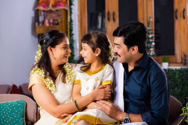 South Indian Young Family with classic look stock photo Indian ethnicity, Indoors, sitting, Traditional clothing, domestic room, traditional festival, south indian lady stock pictures, royalty-free photos & images
