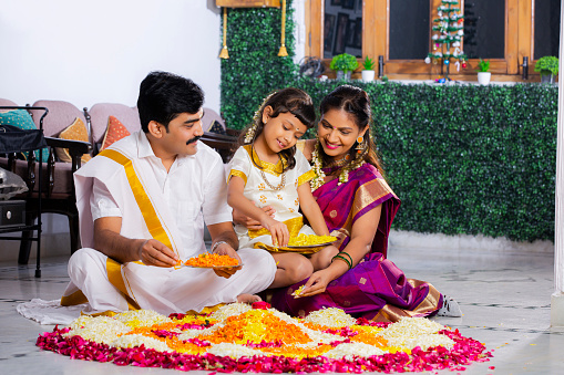 Indian ethnicity, Indoors, sitting, Traditional clothing, domestic room, traditional festival,