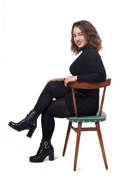 istock woman with chair on white background 1212897981
