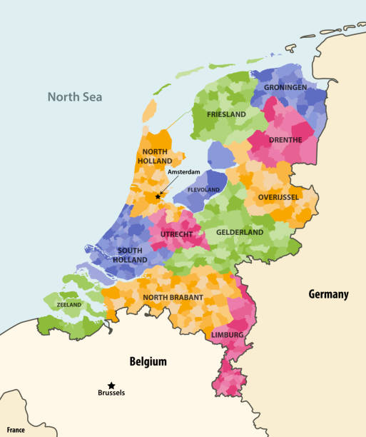 stockillustraties, clipart, cartoons en iconen met de lokale gemeenten van nederland die door provincieskaart met naburige landen en terrotories worden gekleurd. vector - groningen
