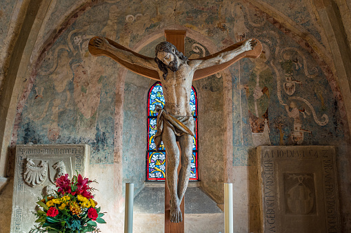 Cross with Jesus Christ in a small church in Germany