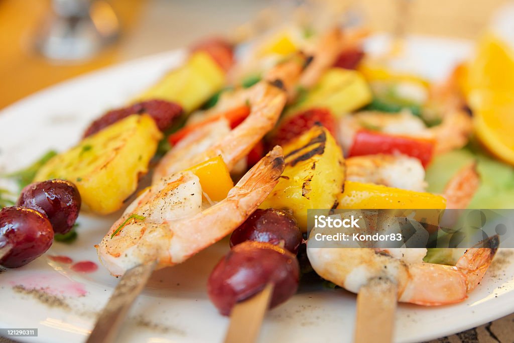 Prawns grilled with fruits  Barbecue - Meal Stock Photo
