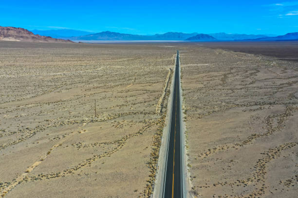 istock Endless road through Death Valley national park 1212903870