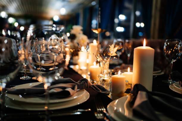 istock festive table setting candles for wedding party 1212905599