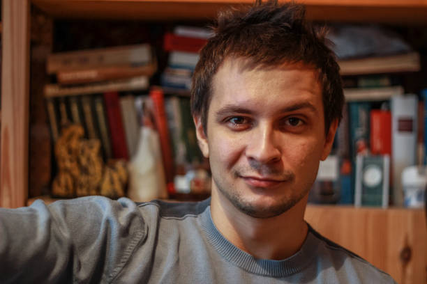 istock Portrait of a young seriously man at home 1212907227