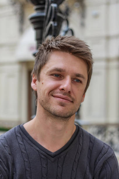 istock portrait of a young attractive blond smiling guy 1212908314