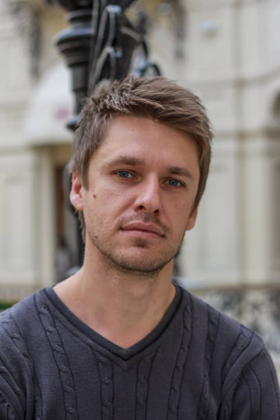 istock portrait of a young attractive blond seriously guy 1212908554