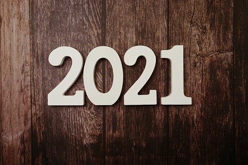 2021 Happy New Year with space copy on wooden background