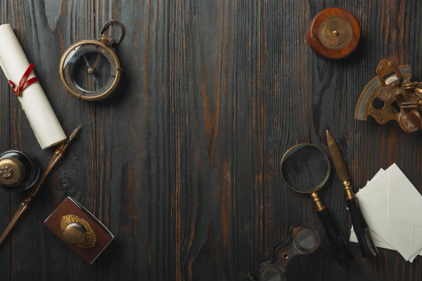 istock Old fashioned flat lay with letters writing accessories on dark wooden background 1212910480