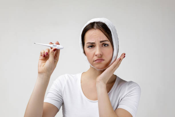 istock young sad woman suffering from tooth pain 1212911633