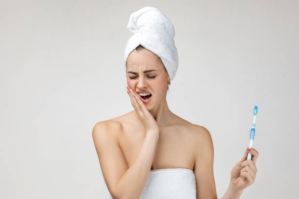 istock young sad woman suffering from tooth pain 1212912171