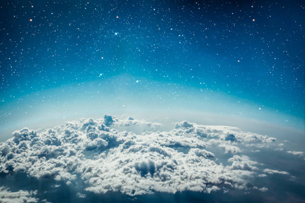 istock nature background. white clouds over blue sky 1212912535