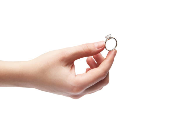 istock Hand on a white background. Ring in the hand. Big Stone Ring 1212912589