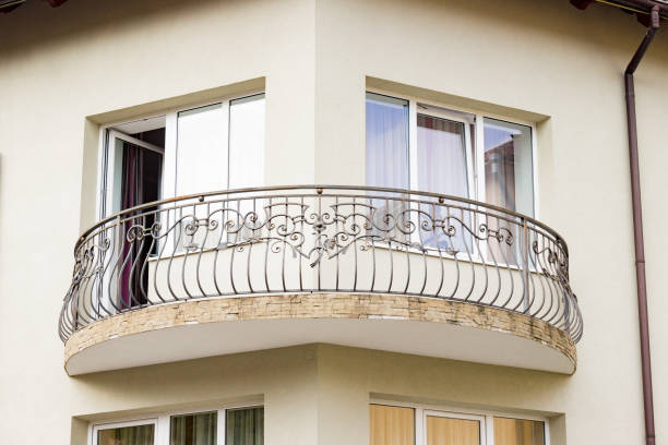 istock Beautiful small corner balcony on a modern building apartment 1212915764